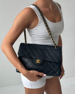 Vintage 90s Chanel Double Sided Black Caviar 24K GHW 30cm Classic Flap Bag